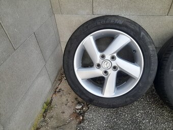 Orig. sadu kol z Mazdy 6 s pneu 205 55 R16, cena 4000,- - 5