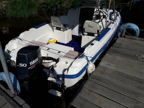 Motorová kajutova loď Jeaneau, s přívěsem - 5
