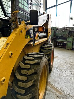 Smykový nakladač Caterpillar 216B3 - 5