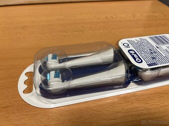 Náhradní kartáčkové hlavy Oral-B iO Ultimate Clean White 4ks - 5