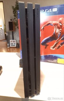 Playstation 4 Pro + 9 her - 5
