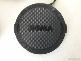 Krytka objektivu, popruh, clona, difuzer, očnice.. - 5