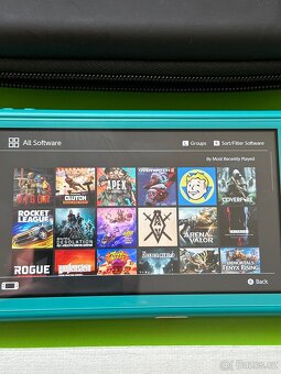 Nintendo Switch Lite 128GB + Spousta her + bonusy Aukce - 5