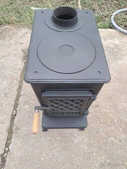 Jotul f602 N  varnou plotnou výkon 4-7 - 5