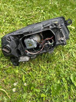 HELLA Přední světlo levé AUDI A6(C6) - 5