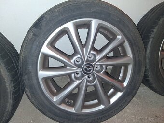 Prodám ALU kola MAZDA - 5
