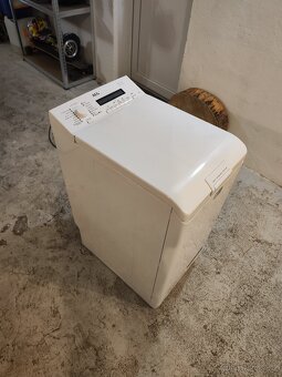 Vrchem plněná pračka AEG - 5