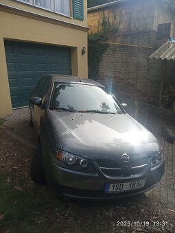 Nissan Almera 1,5 r.v.2005 - 5