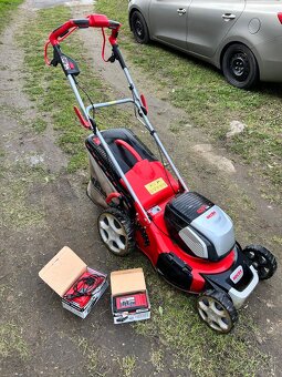 Sekačka na trávu zánovní AKU plus baterie - 5
