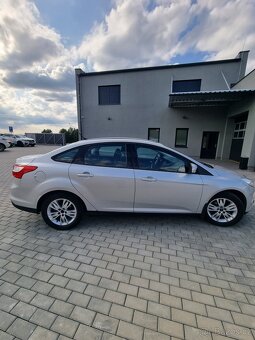 Ford Focus 2011, 1.6, 77Kw sedan - 5