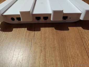 Wifi routery HONOR 3 Wi-Fi 6 Plus a TP-Link Archer C50 - 5