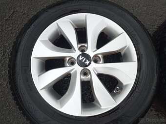 4x100 Kia Rio 5,5Jx15" ET36 č. 52910-1W650 alu disky - 5