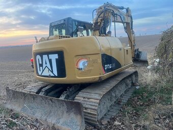 Pásový bagr CAT 311 D - 5