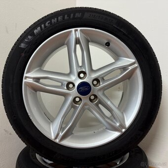 FORD FOCUS/CMAX 5x108 R17 ET50+LETNÍ 215/50R17 6mm - 5