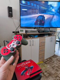 PlayStation 3 Slim + 18her - 5