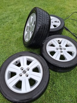 Prodám ALU originál Suzuki . R15 - 5