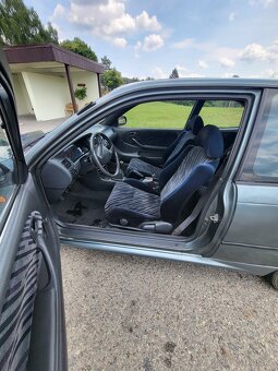 Toyota Corolla 1.6 16V Si | 84 kW | E100 | 1993 - 5