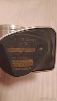 Škrtící klapka VAG 06A133062A - 5