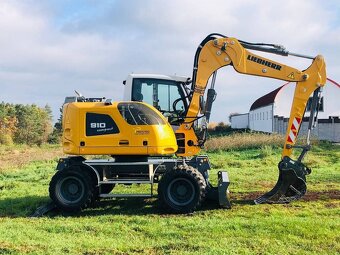 Kolové rypadlo Liebherr A910 - 5