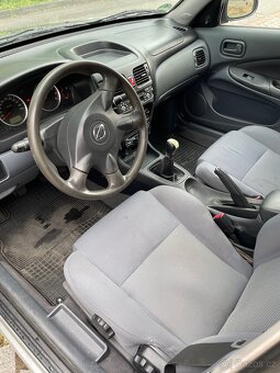 Nissan Almera 1.5 72kw - 5