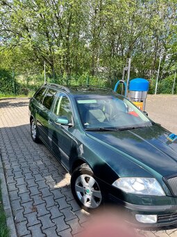 Octavie 2 DSG po repasi 2.0 tdi 103 kw - 5