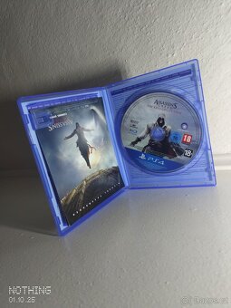 PlayStation 4 slim - 5