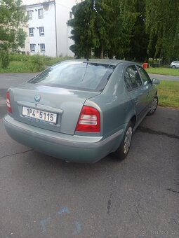 Prodám Octavie 1.6 ,75 kW ,,, plátna STK - 5
