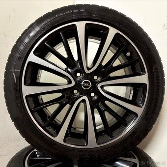OPEL CORSA/ADAM 4x100 R17 ET44+LETNÍ 215/45R17 6mm - 5