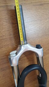 Odpružená vidlice SUNTOUR nrx 7500 28" - 5