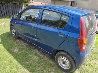 Daihatsu Cuore 1.0 - 5