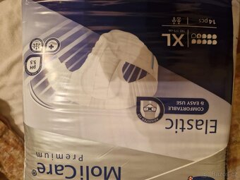 Prodám plenky pro dospělé a jedno balení podložek - 5