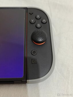Nintendo Switch 2, zánovní + kryty, pouzdro, tvrzené sklo - 5