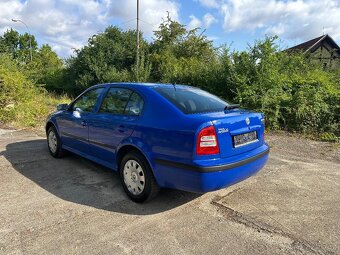 Škoda Octavia 1,6i 75kw výbava TOUR - 5