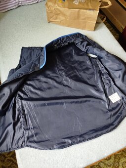 Lehká vesta velikost.38 - 5