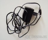 Nabíječka, VHS, TV kabel, redukce na světla. - 5