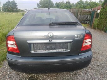 ŠKODA OCTAVIA  1. = 1,6i BENZIN 75 KW  TOUR - 5