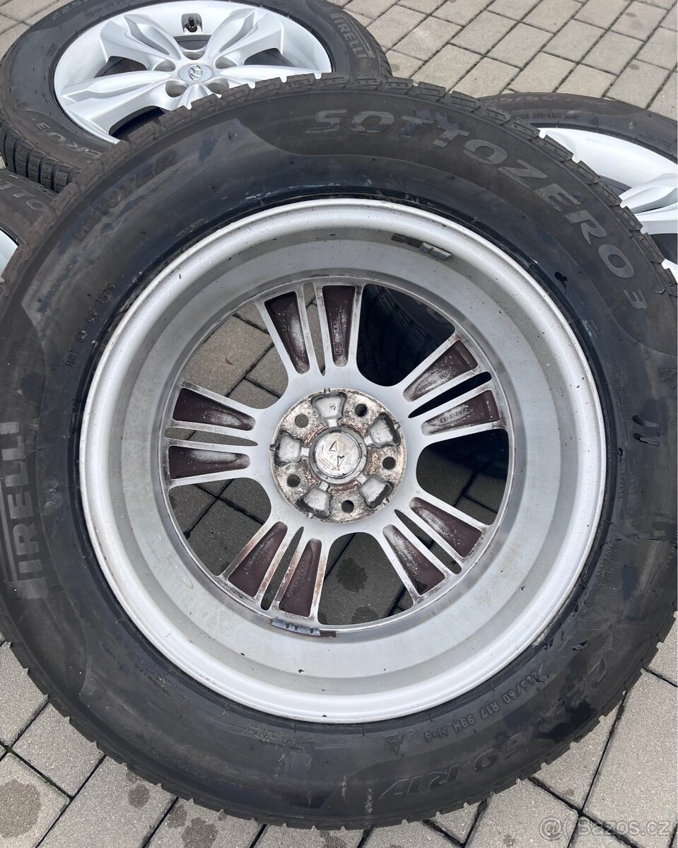 Hyundai Tucson, i35- 17"alu+ 225/60 Pirelli 7-8mm - 6