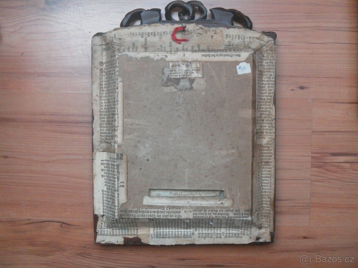 Sv. obrázek s ostatky - datováno 1673. - 6