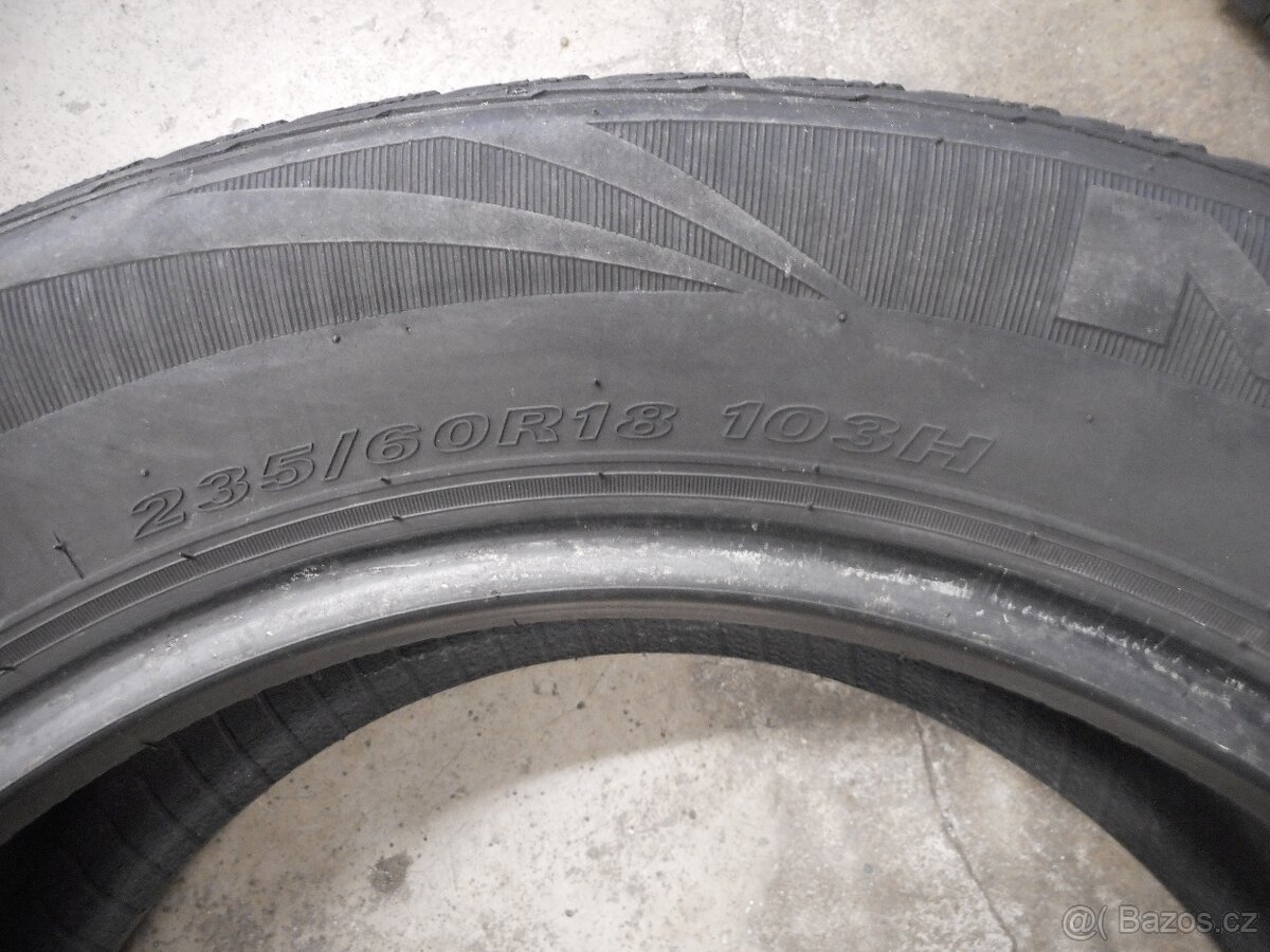 235/60R18 - 6