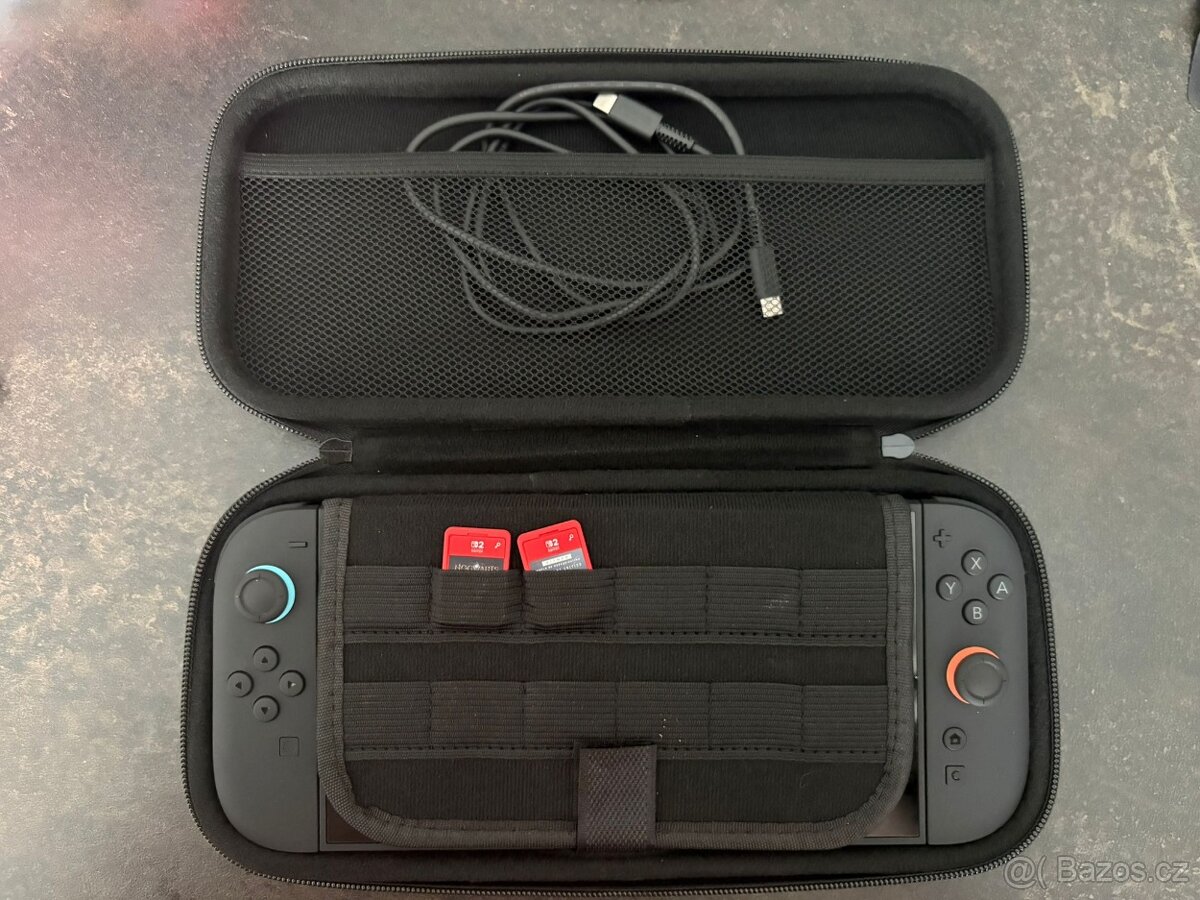Nintendo Switch 2 + 4 hry , obal - 6