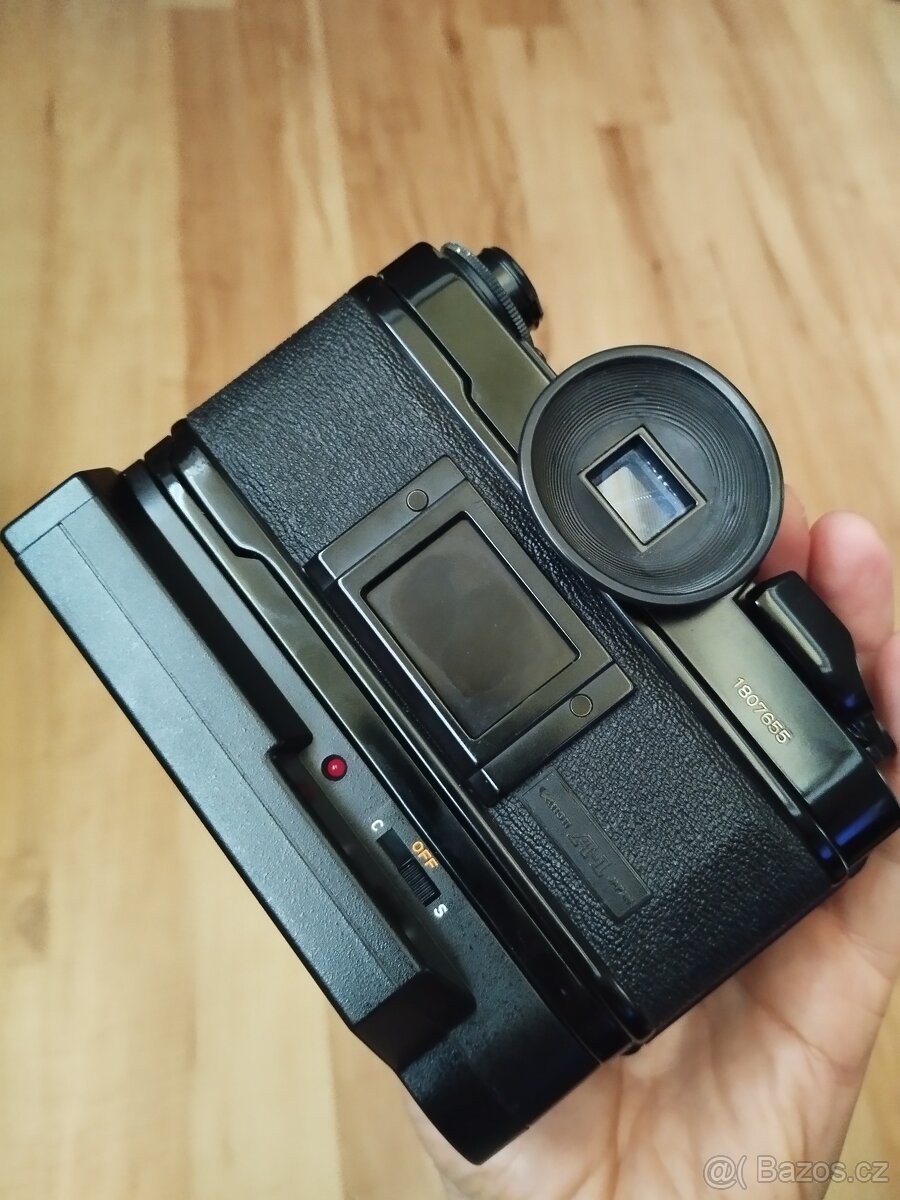 Zniz. cena ....Fotoaparát A1 s obj Tokina 25-50 - 6