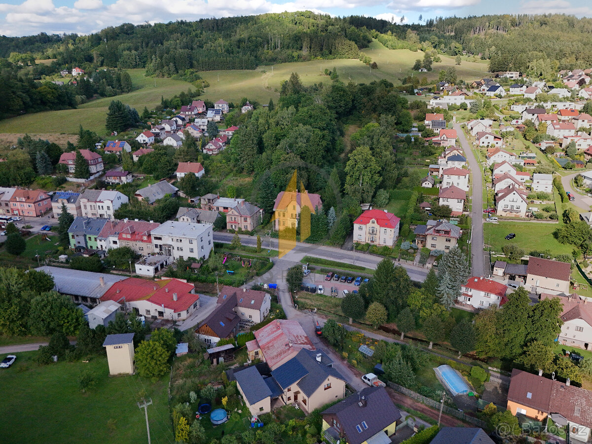 Prodej rodinného domu se zahradou o celkové ploše 216 m² v o - 6