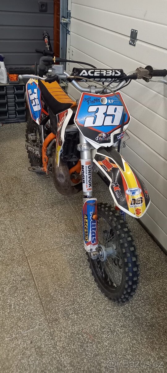 KTM 65 + náhradní díly + oblečení - 6
