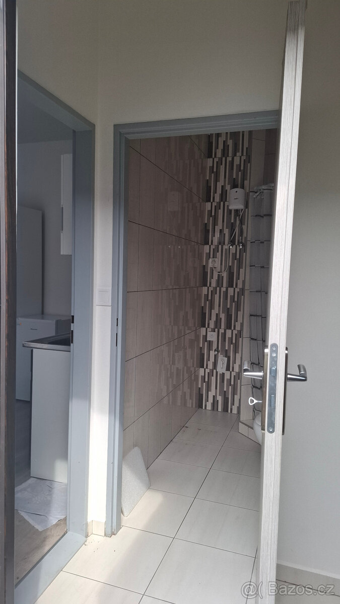 pronájem bytu 1+kk v přístavbě RD - 6