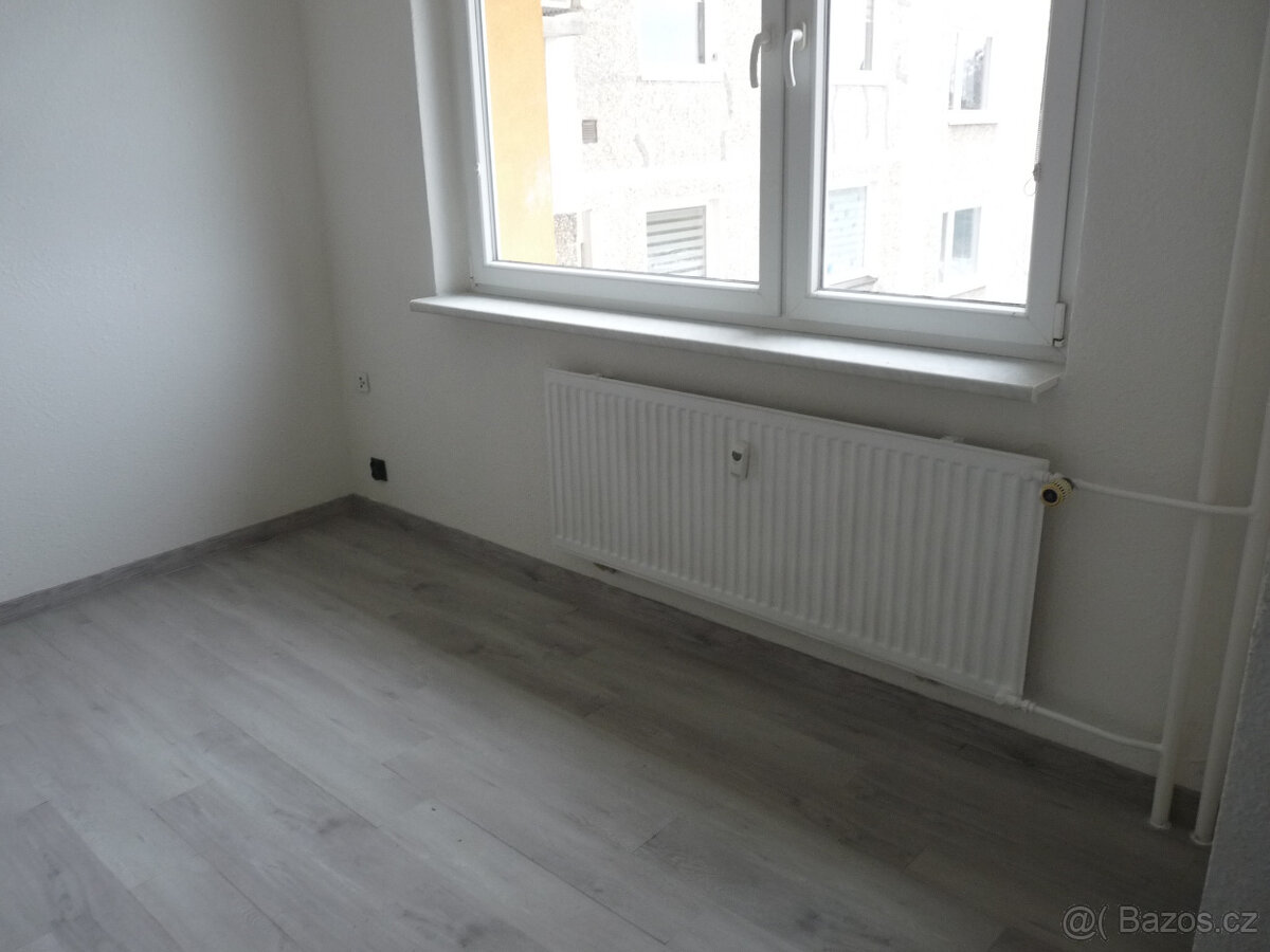 Pronájem kompletně zrekonstruovaného bytu 2+1 Spartakiádní 1 - 6