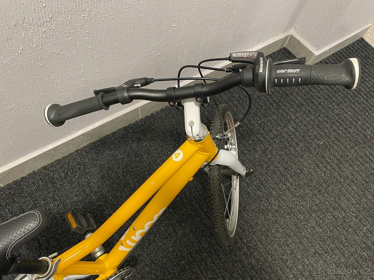 Woom 4 žluté se stojánkem - 6