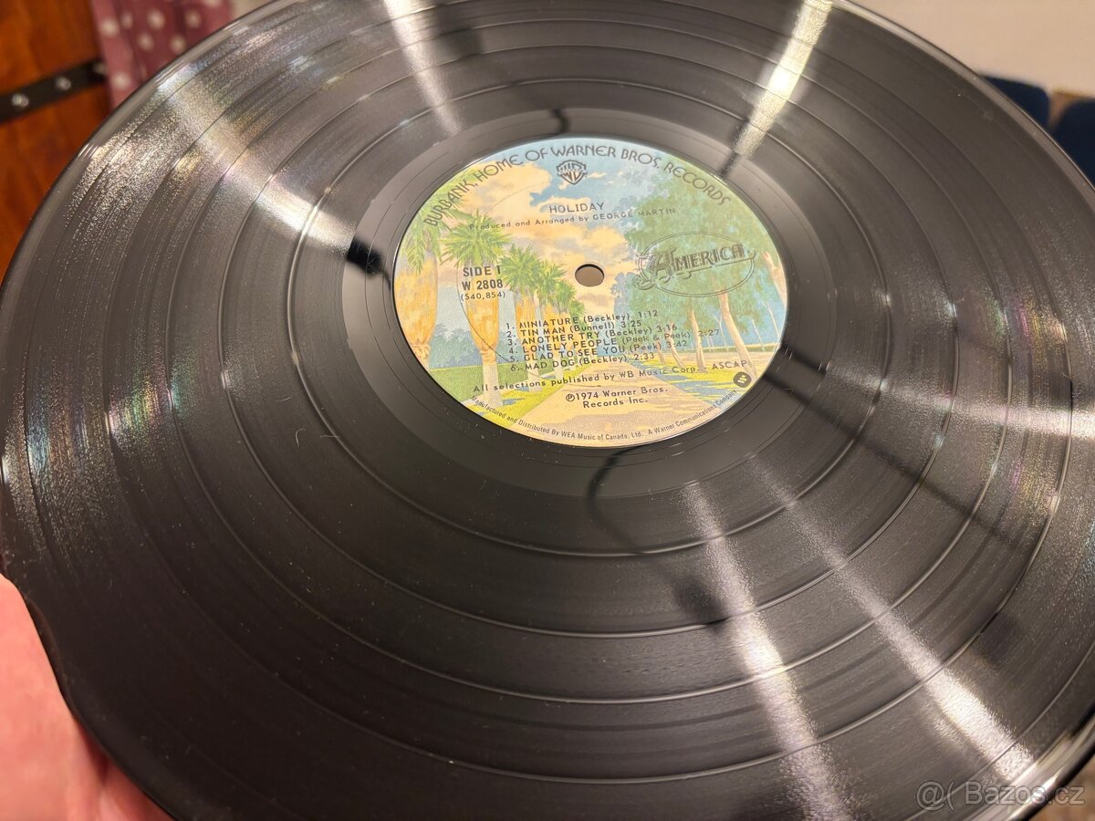 America — Holiday. LP - 6