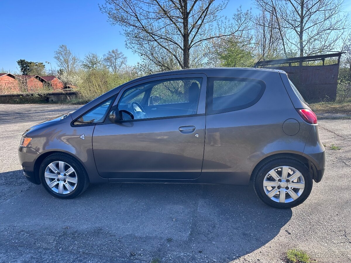 Mitsubishi Colt 1,1i 55kw - 6
