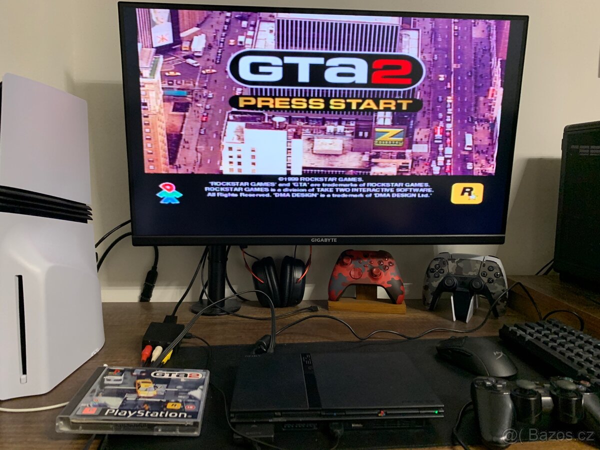 PlayStation 2 Slim + Gran Turismo 4 - 6