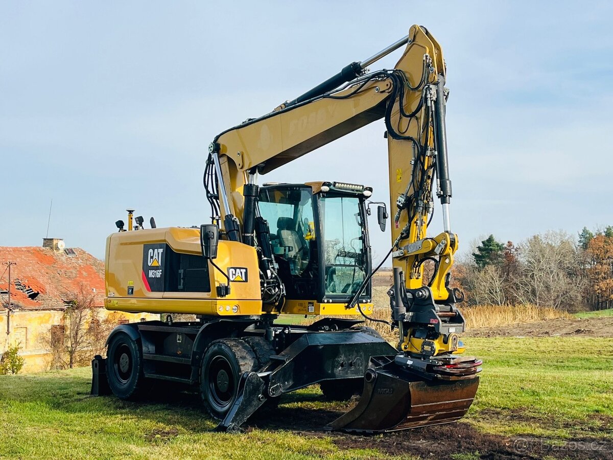 Kolové rypadlo Caterpillar M316F - 6